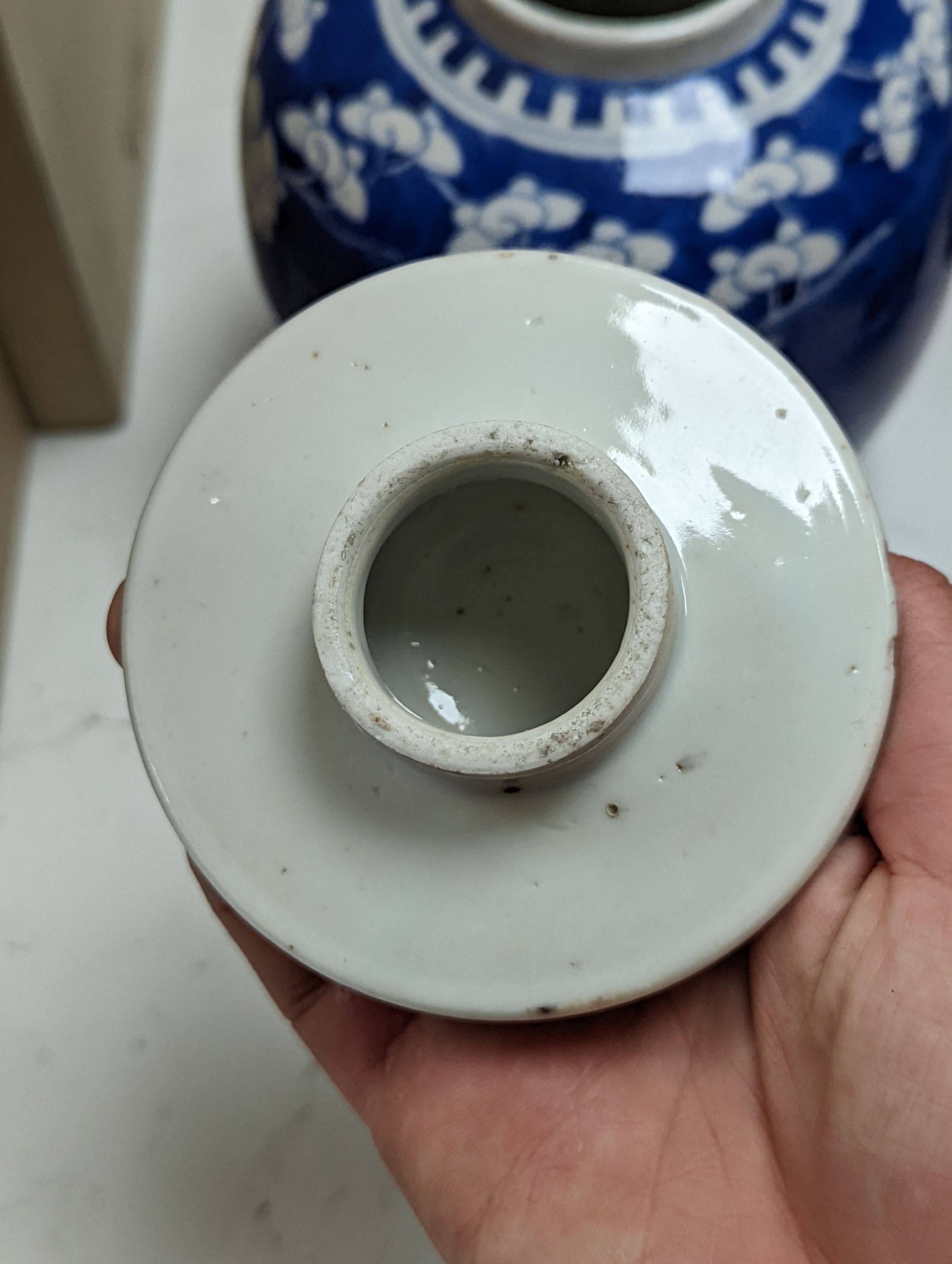 A Chinese famille rose ginger jar, a 19th century Chinese blue and white porcelain jar and cover, a blue and white cylinder vase, a small Chinese dish and orange glass vase (5)